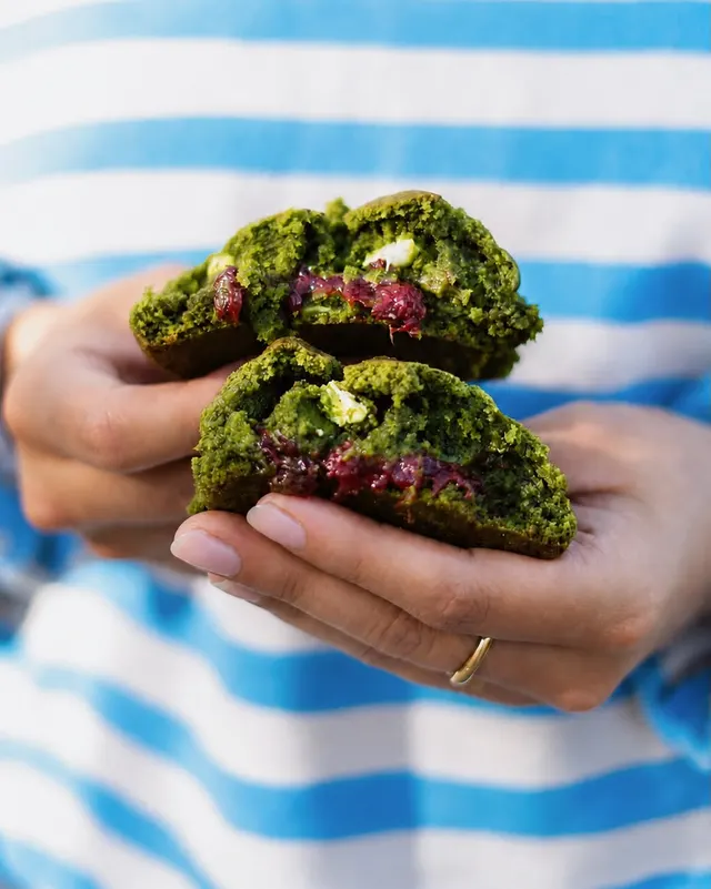 A matcha cookie broken in half